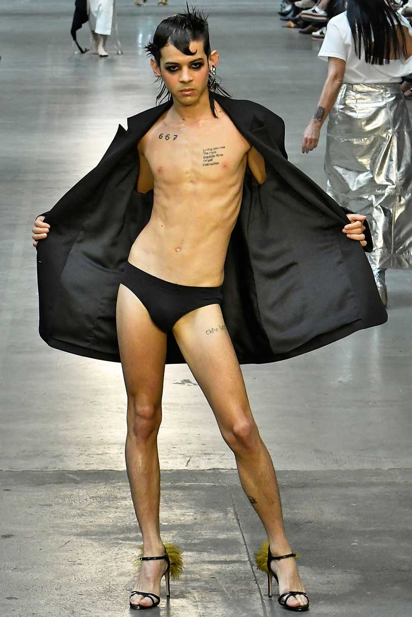 Pregnant man and flower power at London Men's Fashion Week Pregnant man and flower power at London Men's Fashion Week